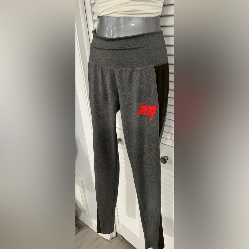 NFL team apparel- Tampa Bay Buccaneers. Grey and black leggings- Size small